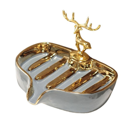 Dekorative Seifenschale mit goldenem Hirsch
