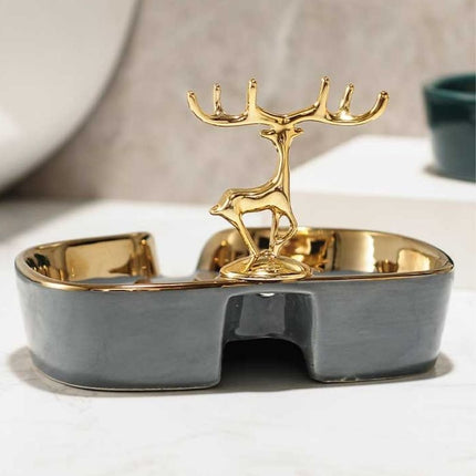 Dekorative Seifenschale mit goldenem Hirsch