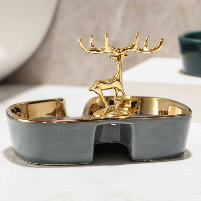 Dekorative Seifenschale mit goldenem Hirsch
